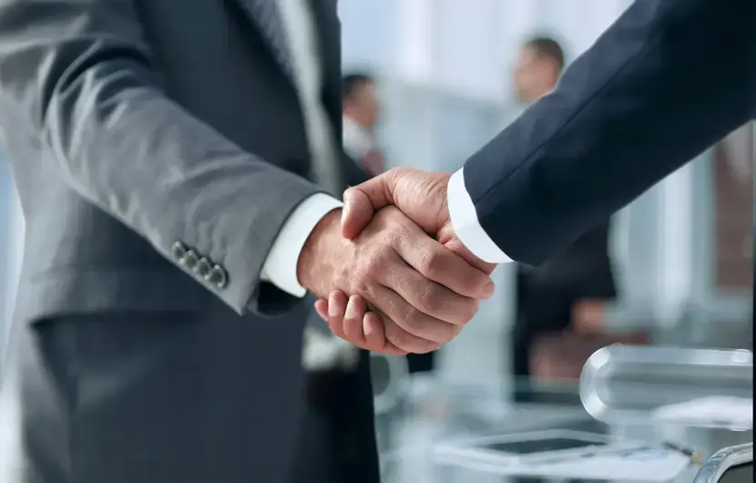 Partner With Us Handshake